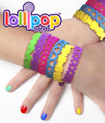 <strong>Close-up of happy hands wearing Lollipop Bandz bracelets.</strong>