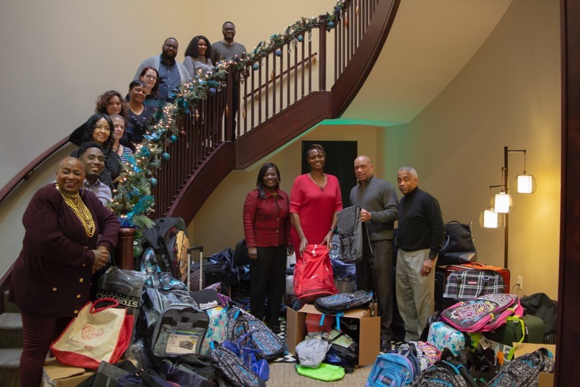 Argent Associates Donates Bags and Bikes for the Holiday Season